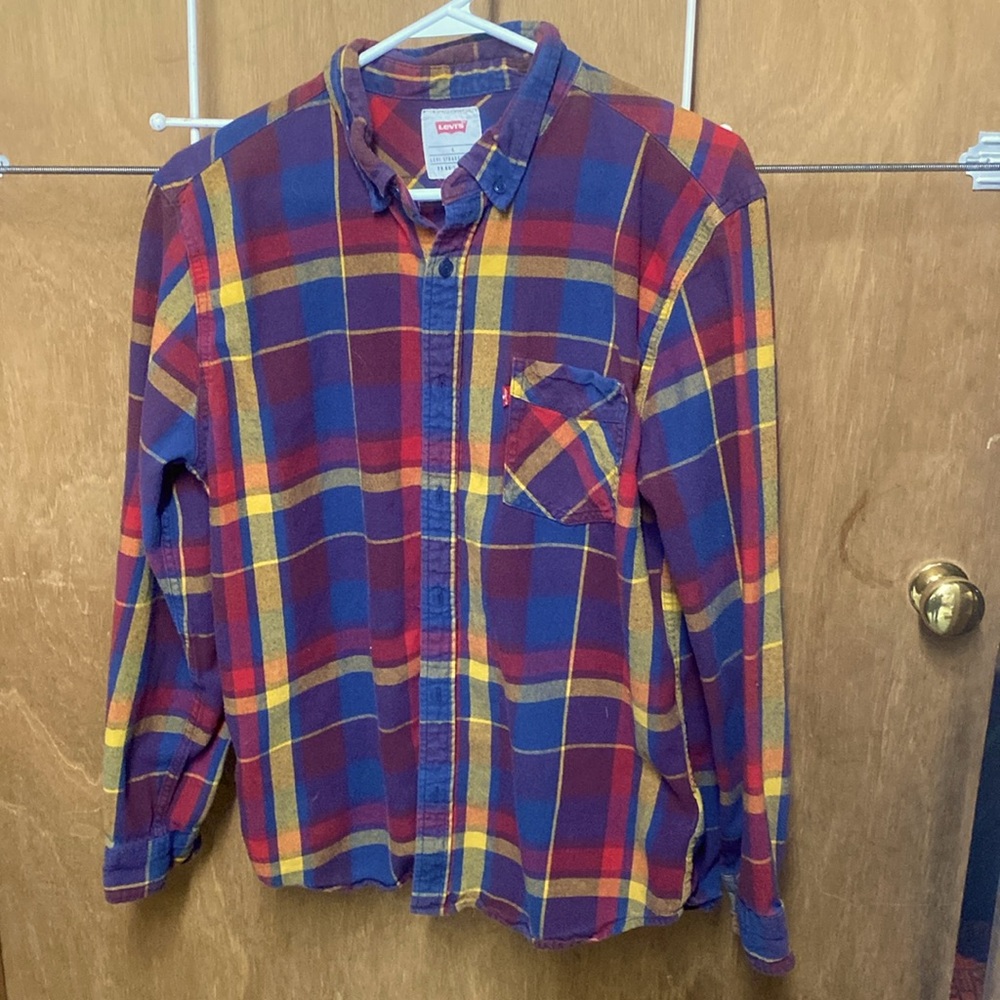 3/$15. Men’s Levi’s plaid shirt, size L (runs small)